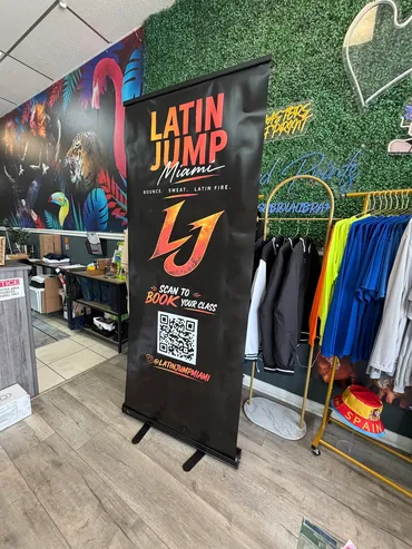 Latin Jump Miami retractable banner inside the Masters of Print shop