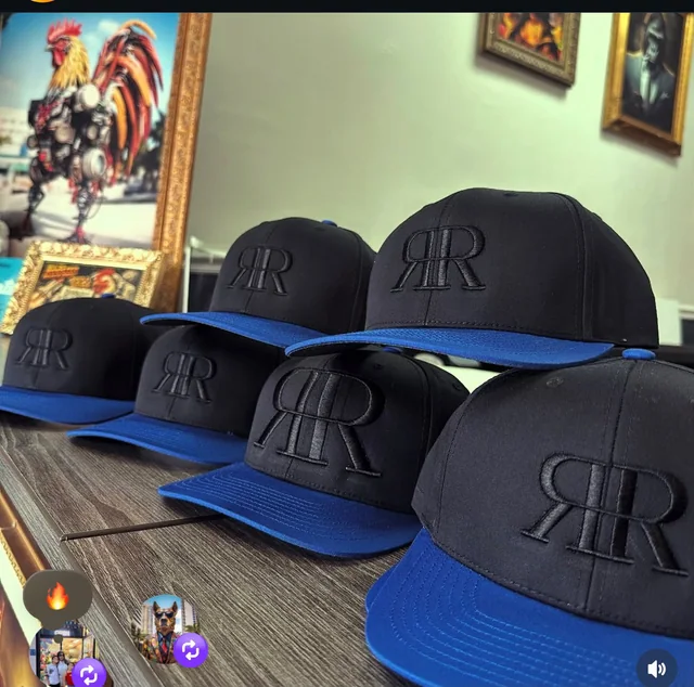 Black embroidered caps with blue brims from Masters of Print in Miami