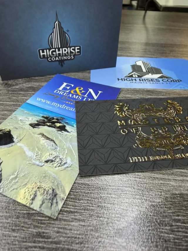 Gold foil and full-color business card samples displayed at Masters of Print in Miami