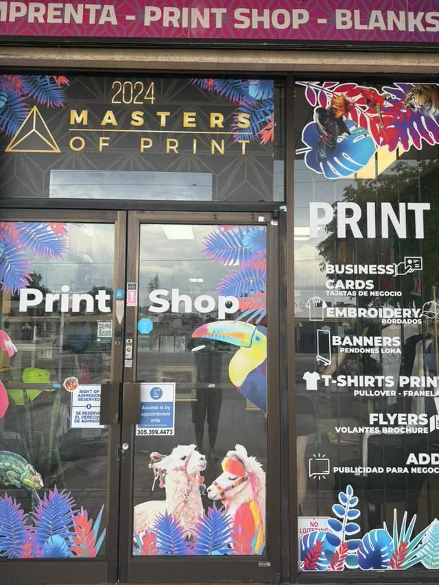 Colorful storefront window graphics at Masters of Print on West Flagler Street in Miami